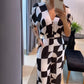 👗Damesjumpsuit met V-hals en geometrische print