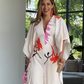 🌸Jumpsuit met bloemen, onregelmatige mouwen en wijde pijpen met V-hals