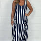 Gestreepte oversized jurk met strik aan de voorkant en zak