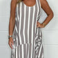 Gestreepte oversized jurk met strik aan de voorkant en zak