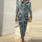 Elegante damesjurk met geometrische print en split