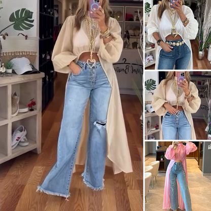 Asymmetrische top met opstaande kraag en pofmouwen