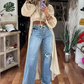 Asymmetrische top met opstaande kraag en pofmouwen